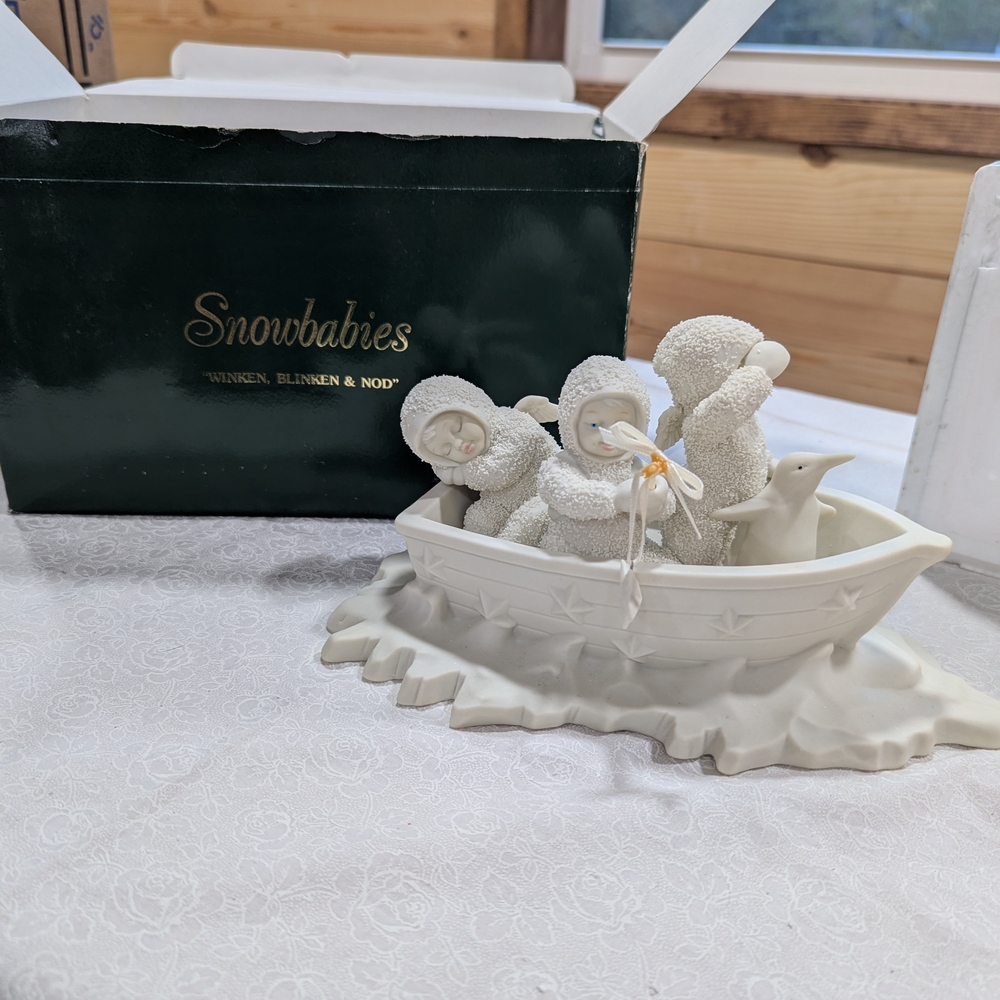 Department 56 Snowbabies in Cream Boat with Penguin